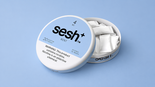Open tin of SESH+™ mint nicotine pouches. 